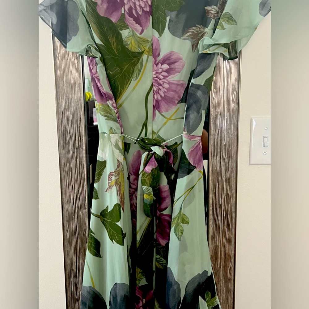 Danny and Nicole’s dress, floral with green background, multiple uses.